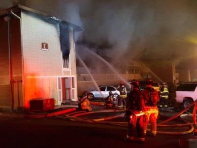 Firefighters battle fatal apartment complex fire